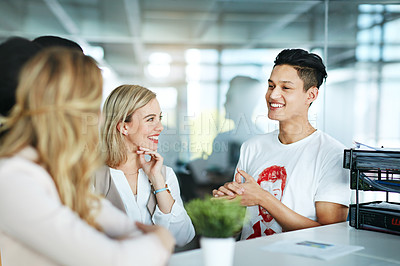 Buy stock photo Shot of a group of colleagues having a discussion at work