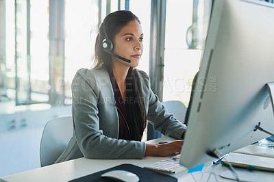 Buy stock photo Call center, computer and consulting with woman in office for customer support, advisory and online. Technology, internet and receptionist with employee at desk for contact us, communication and crm