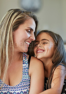 Buy stock photo Cropped shot of a mother and daughter bonding together at home