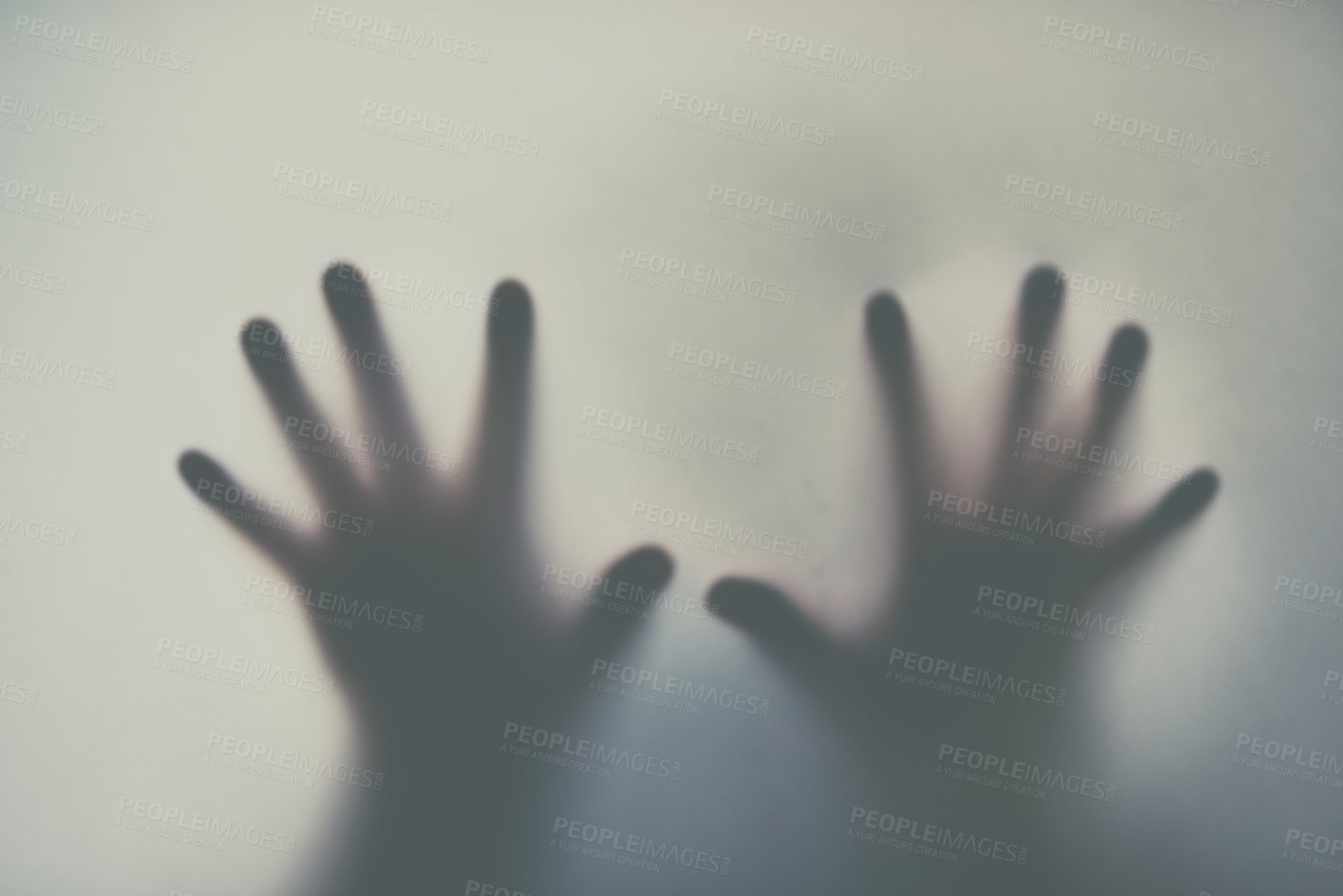 Buy stock photo Defocussed shot of a pair of hands reaching out against a plain background
