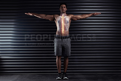 Buy stock photo Full length portrait of an athletic young man standing with his arms outstretched