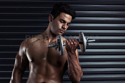 Buy stock photo Dumbbell, fitness and man with exercise, training and cardio for progress, endurance and performance. Person, gym equipment or guy with workout goals, strong or wellness with power, health or topless