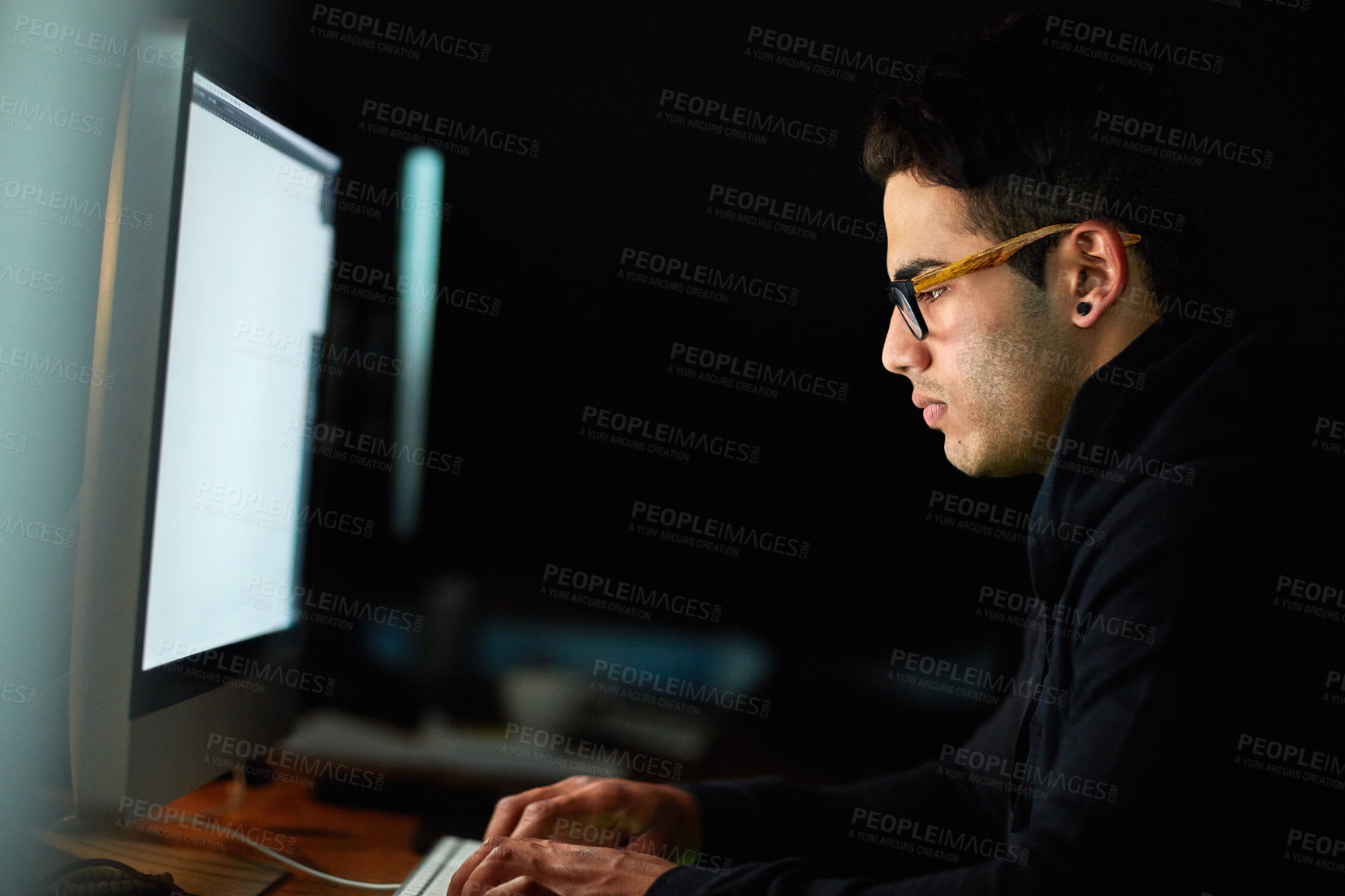 Buy stock photo Computer, typing and man at night for software development, programming update and information technology. Focus, research and geek or programmer person on desktop screen for website cyber security