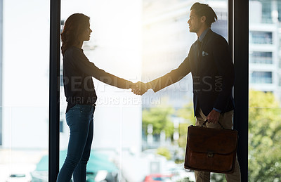 Buy stock photo Silhouette, handshake and business people in office for agreement, planning and teamwork. Corporate workplace, collaboration and man and woman shaking hands for partnership, thank you and welcome