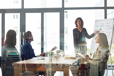 Buy stock photo Multiple exposure shot of a corporate business meeting superimposed over a cityscape
