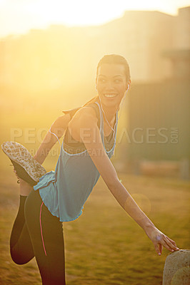 Buy stock photo Woman, stretching and park with smile for exercise with thinking, subscription or buildings in city. Girl, person and athlete at training, workout or earphones for music streaming for warm up at park