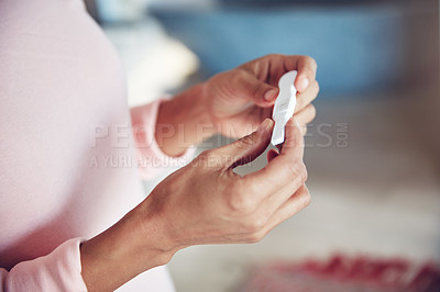 Buy stock photo Closeup, hand and woman with a pregnancy test, waiting for the results and wellness at home. Zoom, female person and lady with expectation, pregnant and future maternity with fertility treatment