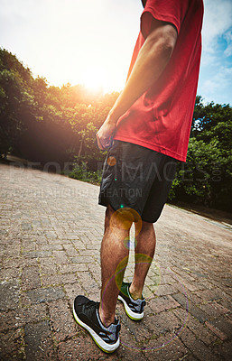 Buy stock photo Cropped shot of a sporty man standing outside