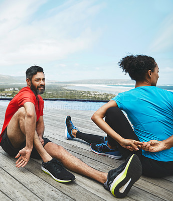 Buy stock photo Stretching, legs and couple in exercise at beach to start fitness, training or outdoor on deck. Workout, preparation and people together for sports, performance and stretch for back and body wellness