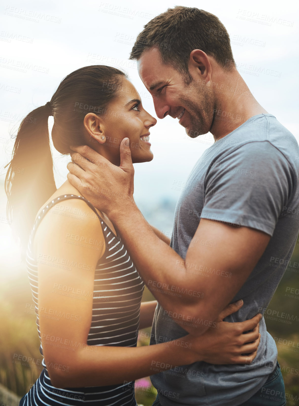 Buy stock photo Romance, love or happy couple in nature outdoor date with loyalty for commitment, care or respect. Eye contact, trust or man with woman hug on holiday vacation for bond, support or wellness and flare