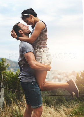 Buy stock photo Love, lift or happy couple hug in park for date or care in nature with support, bond or freedom. Eye contact, romantic man or woman excited by holiday vacation together to celebrate, relax or travel