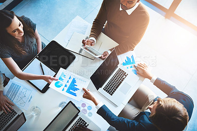 Buy stock photo Laptop, paperwork and business people coworking with charts, graphs and statistics for productivity growth. Data analysis, men and women with tech for development, planning and office from above