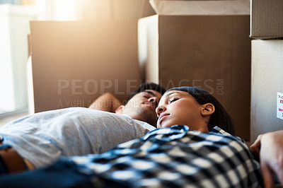 Buy stock photo Couple, rest and sleeping by boxes in new home with relax for property investment and moving day for homeowner. Achievement, people and dream house purchase with nap, real estate and mortgage sale