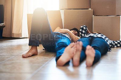 Buy stock photo Couple, floor and relax in new home with boxes for property investment and moving day for homeowner. Achievement, people and dream house purchase on ground in apartment with love for mortgage sale