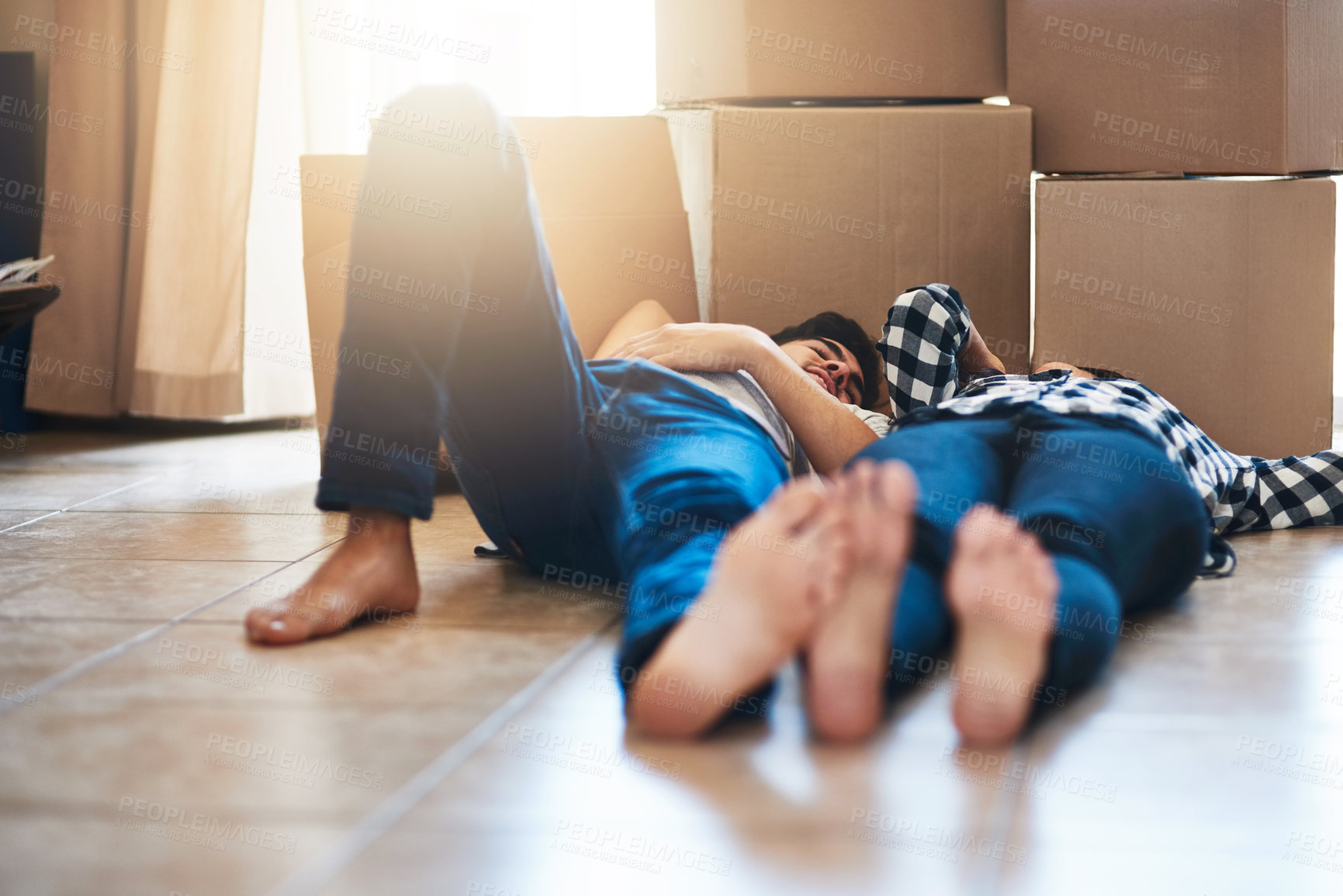 Buy stock photo Couple, floor and relax in new home with boxes for property investment and moving day for homeowner. Achievement, people and dream house purchase on ground in apartment with love for mortgage sale