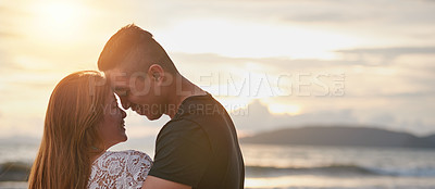 Buy stock photo Cropped shot of a young couple sharing an intimate moment