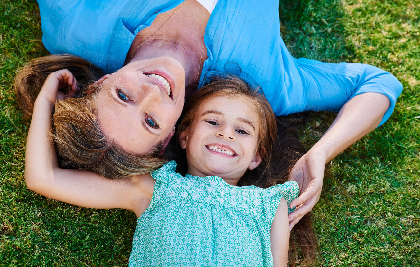 Buy stock photo Woman, girl and portrait in backyard for relax, above and holiday in countryside with care. Green, grass and family together in garden with happiness for springtime, vacation and smile in nature 