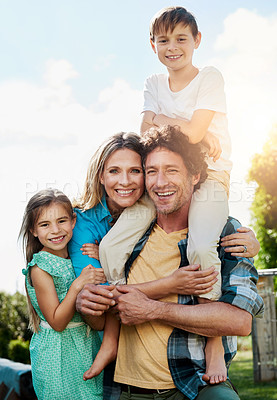 Buy stock photo Portrait of a happy family spending time together outdoors