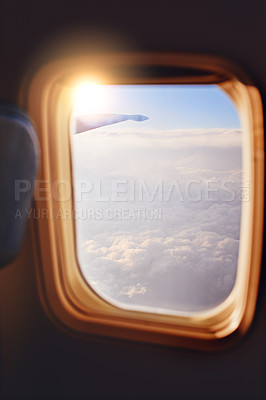 Buy stock photo Shot of the view through an airplane window