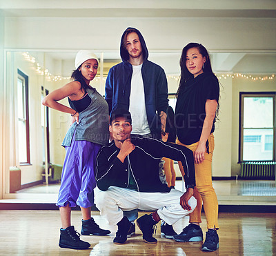 Buy stock photo Shot of a group of young friends hanging out in a dance studio