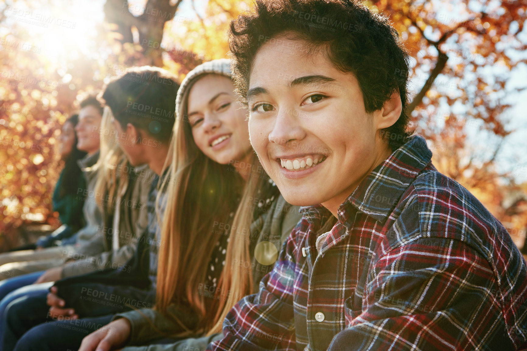 Buy stock photo Teenager, group and portrait in park, boy and together on holiday, nature and relax by trees. Youth culture, happy friends and gen z school kids in sunshine, woods or garden for vacation in Canada