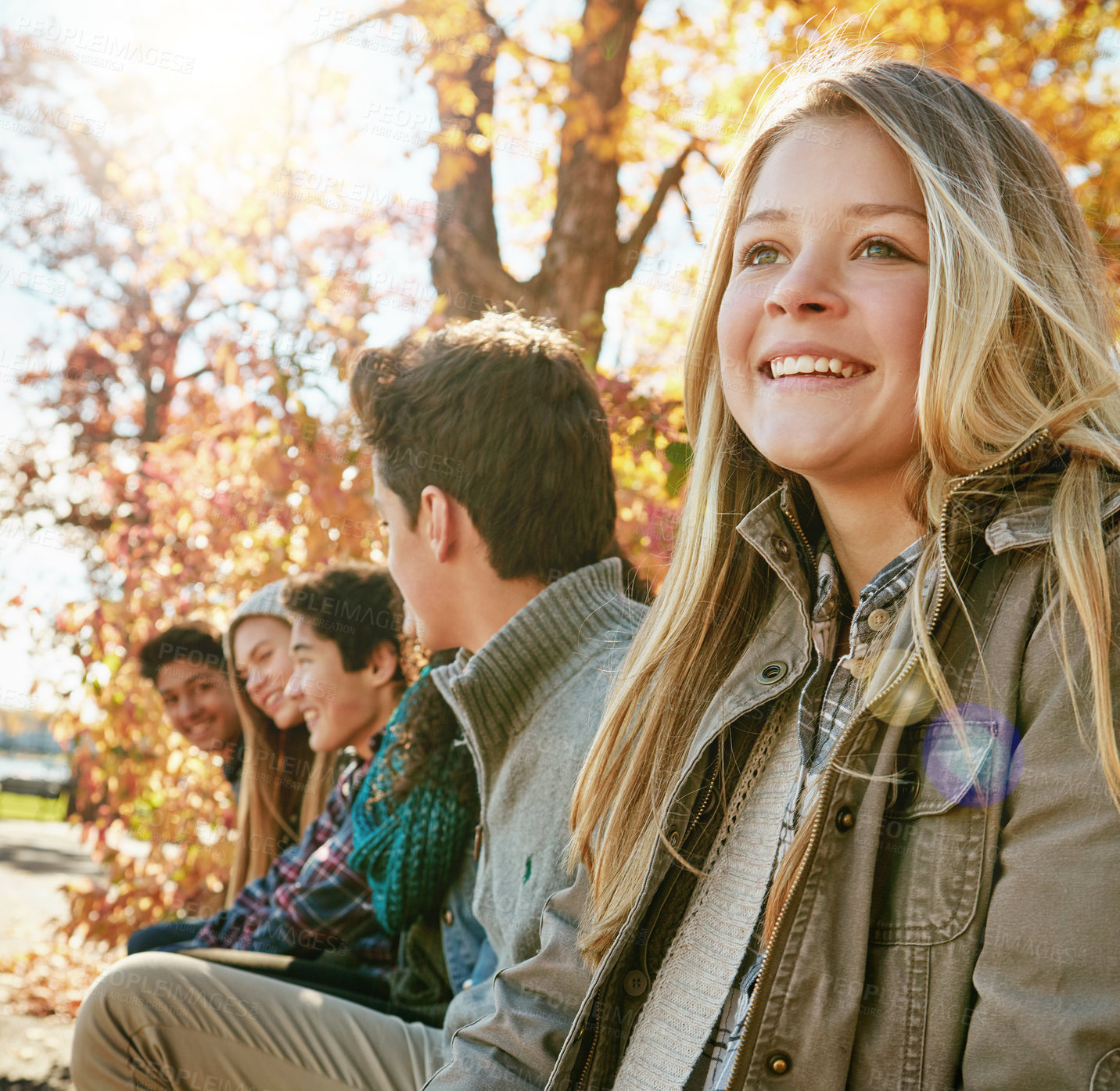 Buy stock photo Nature, youth and group of teenagers on vacation, adventure or weekend trip together in Autumn. Smile, travel and young kids on holiday sitting in outdoor garden, park or field in New Zealand.