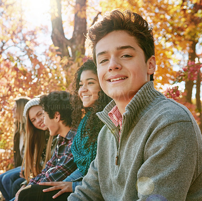 Buy stock photo Boy, group and park with relax or teen with casual, trees in nature with smile. Friends, people and young in portrait or happy with diversity in garden for friendship, youth or wellness in Canada