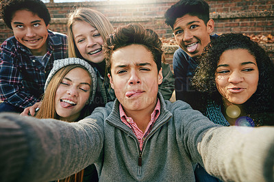 Buy stock photo Selfie, funny face or portrait of friends in park for social media, online post or profile picture in autumn. Boys, girls or gen z people taking photograph on fun holiday vacation to relax in nature