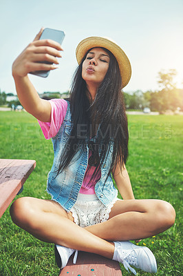 Buy stock photo Smile, girl and selfie on bench in park for profile picture on social media or memory of summer vacation in California. Woman, pout and holiday with photography or live blog for content creation.