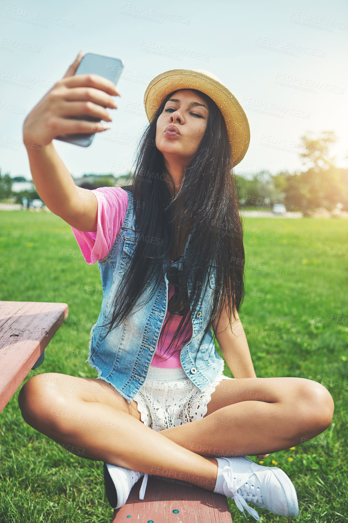 Buy stock photo Smile, girl and selfie on bench in park for profile picture on social media or memory of summer vacation in California. Woman, pout and holiday with photography or live blog for content creation.