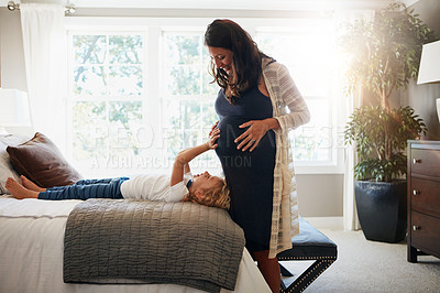 Buy stock photo Home bedroom, pregnant woman and child touch, feel or massage stomach or excited for baby movement. Expectation, maternity and relax kid check life growth, pregnancy or belly of mother or mom on bed