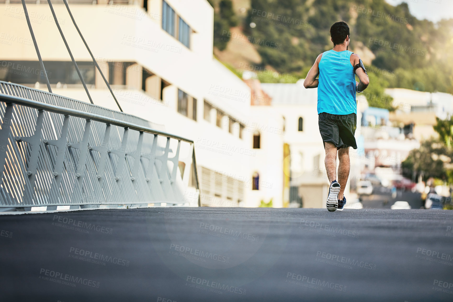 Buy stock photo Back, fitness and running with man, sunshine and exercise with progress, workout and challenge. Athlete, healthy person and runner in city, lens flare or training for wellness, energy and endurance