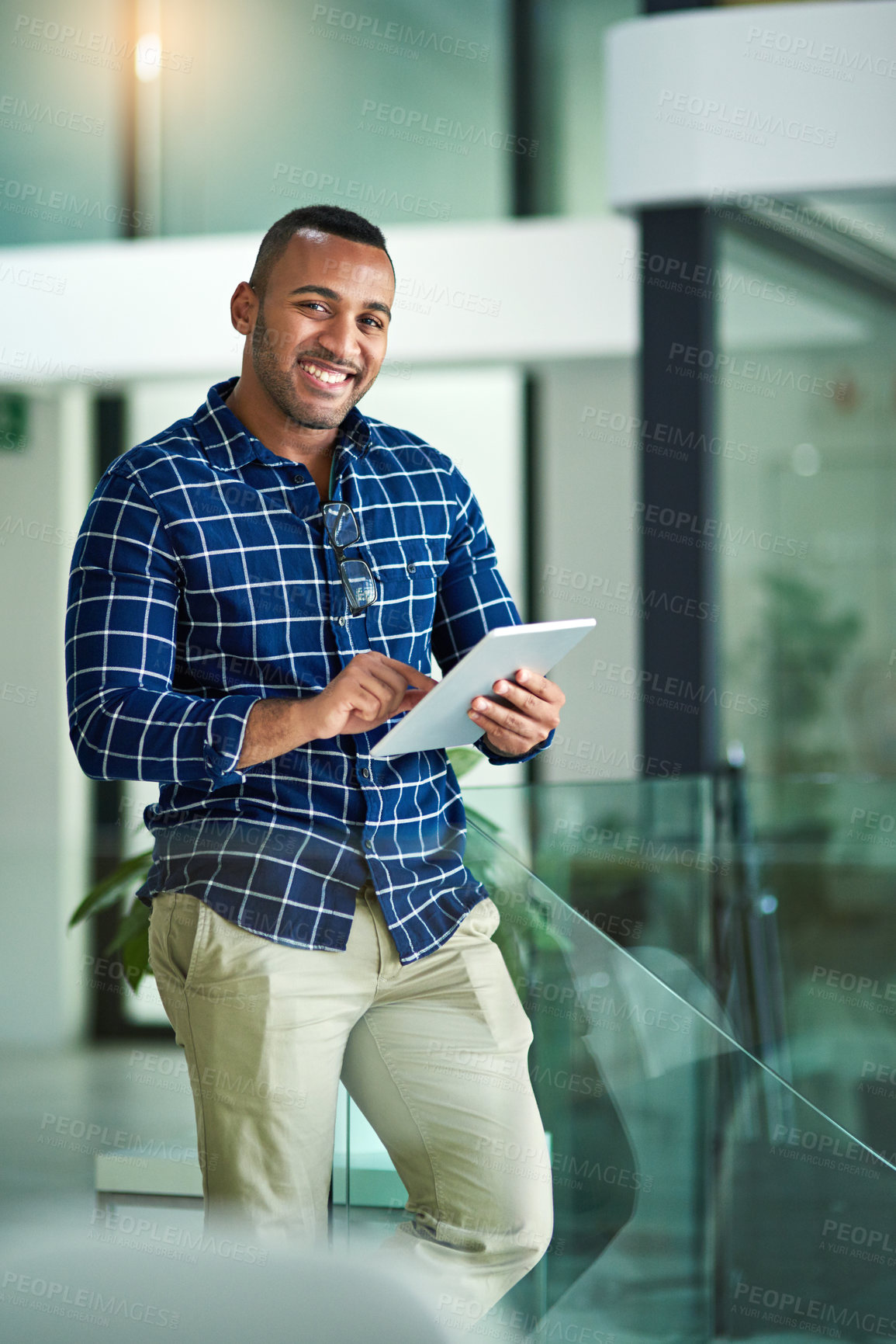 Buy stock photo Black man, portrait and tablet in office with smile for career, social media management for company. Professional, creative or male person with ebook for research with email marketing, happy for post