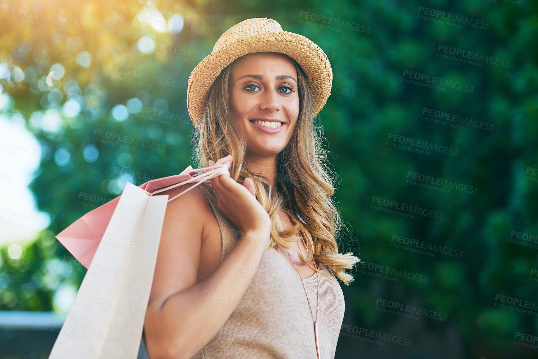 Buy stock photo Fashion, woman and portrait in city for shopping, market and happiness for sale in street. Customer, bags and female person on sidewalk and trees or smile for sunshine, deal or discount in Paris