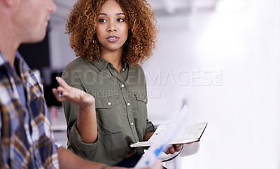Buy stock photo Cropped shot of two young designers working together in an office