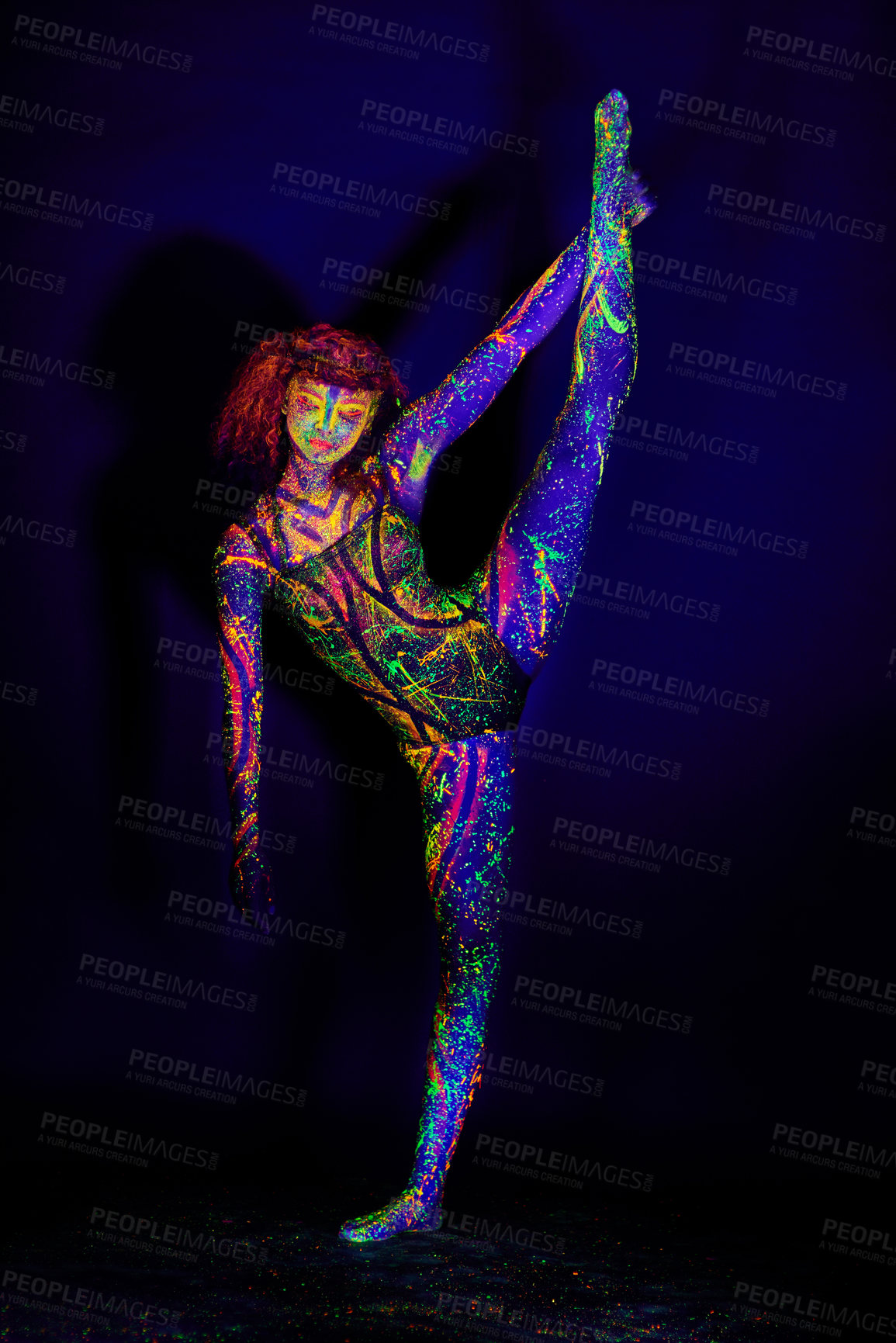 Buy stock photo Body paint, dance and woman in studio for art, culture and stretching in neon fantasy aesthetic. Creative, design and girl in color makeup for dance, identity or unique character on black background