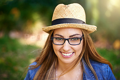 Buy stock photo Portrait of an attractive young woman enjoying a day outside in the park