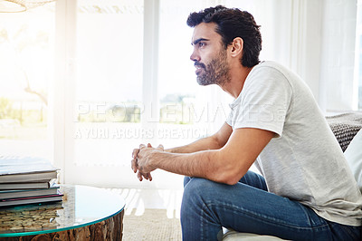 Buy stock photo Shot of a man relaxing on the sofa at home