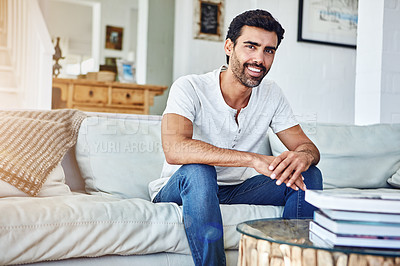 Buy stock photo Portrait of a man relaxing on the sofa at home