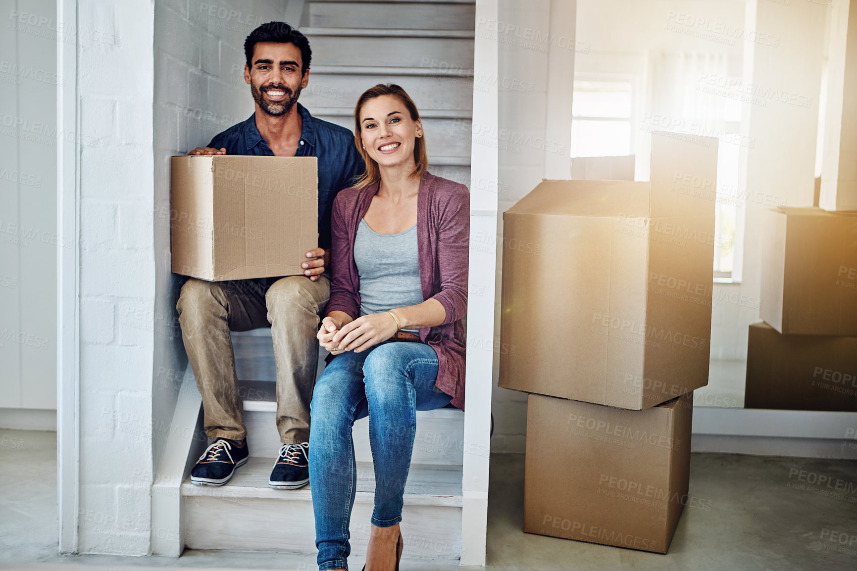 Buy stock photo Portrait of a couple moving into their new home