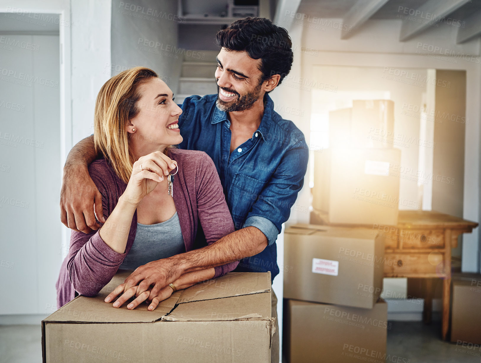 Buy stock photo Couple, relocate and house with keys or boxes, property and  investment with trust and support or mortgage. Opportunity, new home and residential buyer, ownership together and achievement or moving