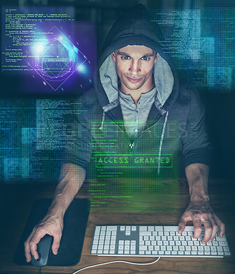 Buy stock photo Shot of a young programmer working on his computer late at night