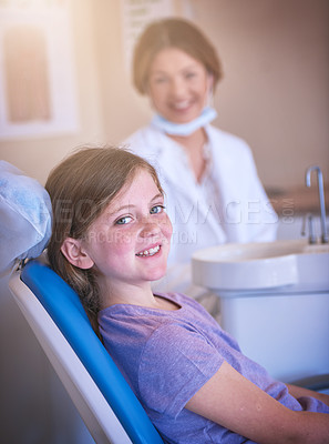 Buy stock photo Shot of a little girl at the dentist for a checkup