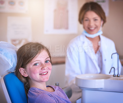 Buy stock photo Shot of a little girl at the dentist for a checkup