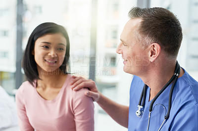 Buy stock photo Man, asian woman and doctor comfort with smile for consultation good news with healthcare, empathy or discussion. Medical worker, patient and happy in hospital for wellness care, support or recovery
