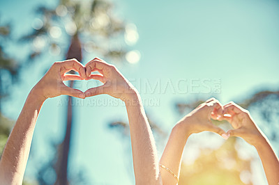 Buy stock photo People, blue sky and hands with heart shape for teamwork, caring and support with kindness sign. Outdoor, friendship and love symbol for solidarity, wellness and peace with emoji gesture in nature