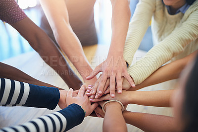 Buy stock photo Teamwork, hands stack and business people on table in office for collaboration, community and agreement. Startup company, diversity and above of men and women for meeting, support and team building