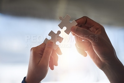 Buy stock photo Hands, puzzle and people collaboration for company, lens flare and support for planning. Partnership, collaborate and problem solving for project development, unity for teamwork and group mission