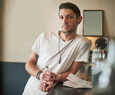 Buy stock photo Portrait, man and bartender at pub, restaurant or cafeteria with receipt for order on menu. Face, bar and confident small business owner, entrepreneur or serious waiter with inflation at startup shop