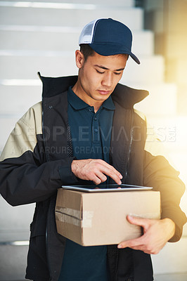 Buy stock photo Cropped shot of a courier using a digital tablet while making a delivery in an office